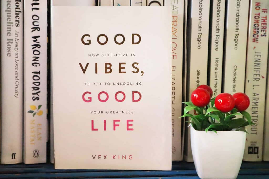Photo of books. In focus is Good Vibes, Good Life by Vex King. A book is one of the best gifts you can give a friend. 